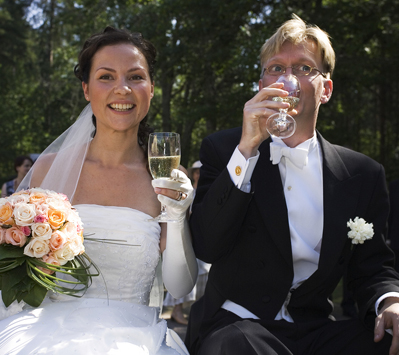 Bride and groom with champagne glasses